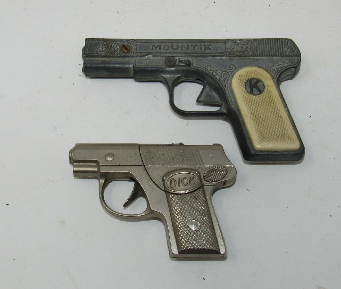 Mountie & Dick Cap Guns: Mountie is approx 6" long and jammed up