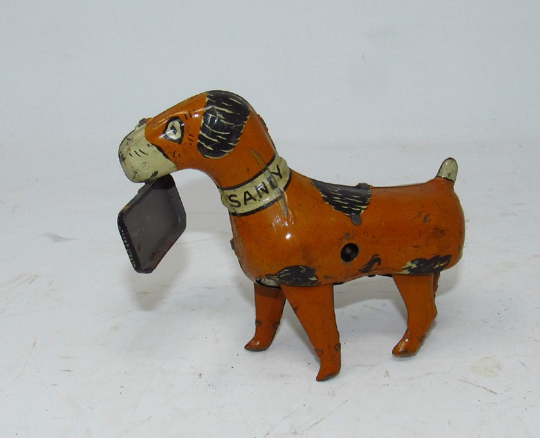 Marx Sandy Orphan Annie Wind Up Dog Toy: Approx 5 1/2" long. Sold in untested condition.