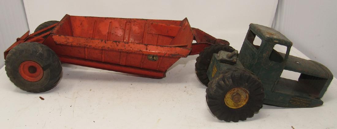 Model Toys Earth Mover and Nylint Tractor: Both need to be cleaned. Tractor is missing exhaust stack.