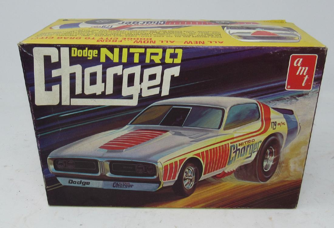 Dodge Nitro Charger Funny Car Model with Box and Parts: Getting all pictured. We do not look thru boxes for missing or damaged pieces. Sold as is