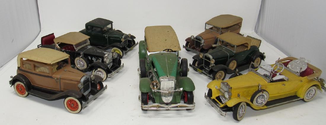 7 Hubley Model Kit Cars: All are sold in as is condition. We do not check every car for missing parts or damage. Most look to be missing something or have damage. Sold as is