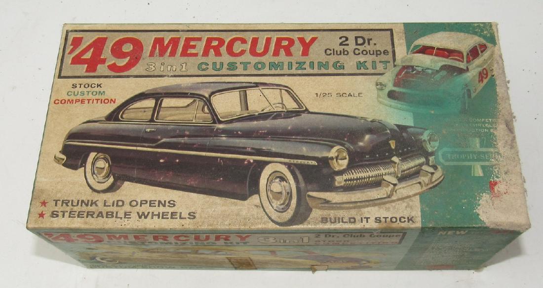 1949 Mercury 3in1 Amt Customizing Model Kit: Box has wear. We do not look thru and make sure all the parts are there or if there are any broken pieces. Sold as is,