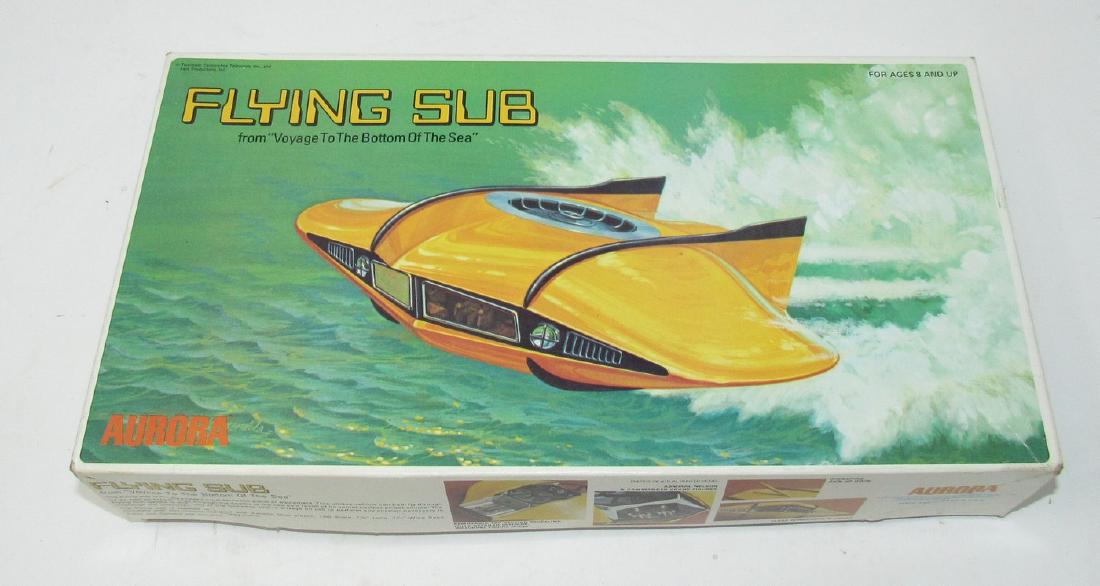 Aurora Flying Sub No. 254 Model: Box is in very good condition. We do not look thru and make sure all the parts are there or if there are any broken pieces. Sold as is,