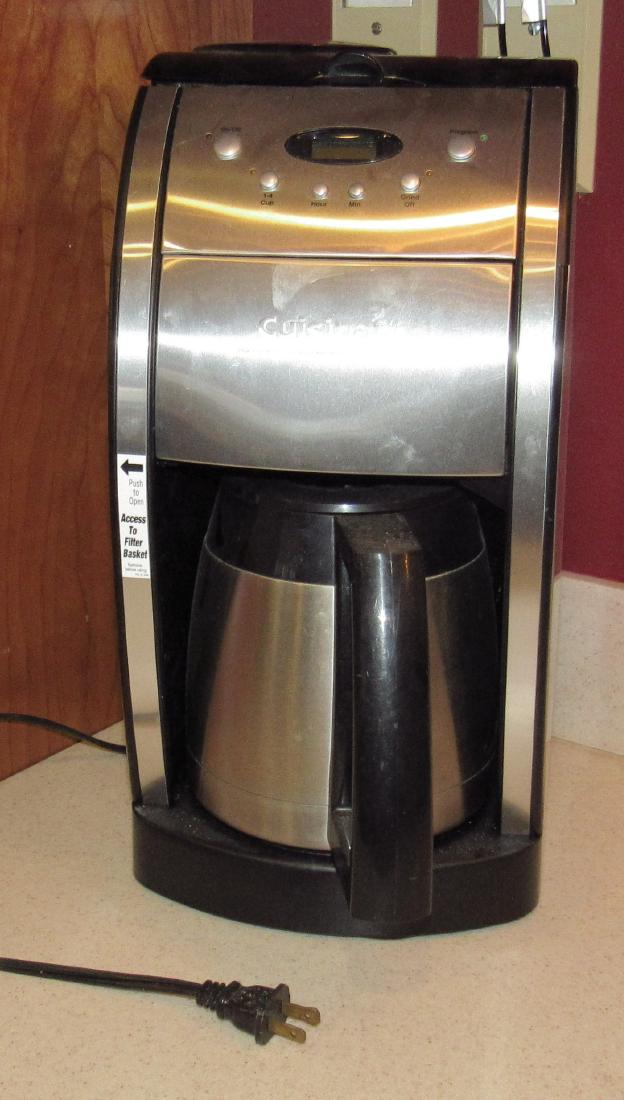Cuisinart Grind & Brew Coffee Maker: Powers on. Sold in untested condition