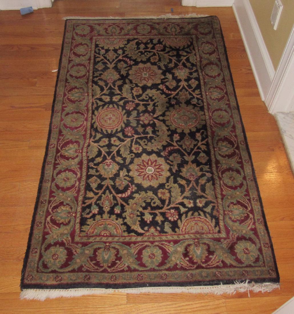 Oriental Area Rug: Approx 36" x 64" . Needs light cleaning