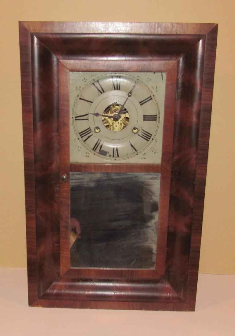 Seth Thomas Clock: Approx 15" x 25". Comes with pendulum, key, and 2 weights. Case has damage ( as pictured) . Sold in untested condition