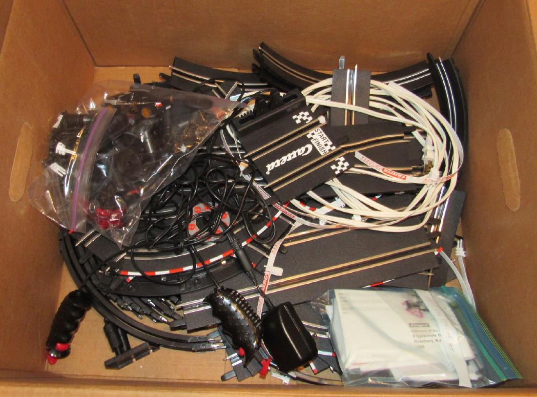 Slot Car Track: Comes with 2 cars. Sold in untested condition