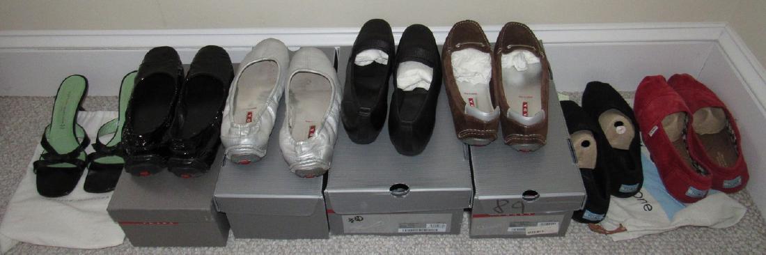 Large Lot of Shoes Including Prada Gap Birkenstock: a lot of size 9. Some used, slightly used, and some never used. Sold as is.
