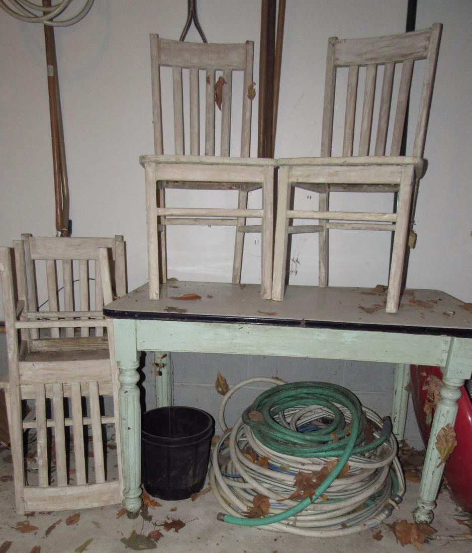 Porcelain Top Table with 4 Chairs: Also included is garden hose. Table is approx 27" x 48"