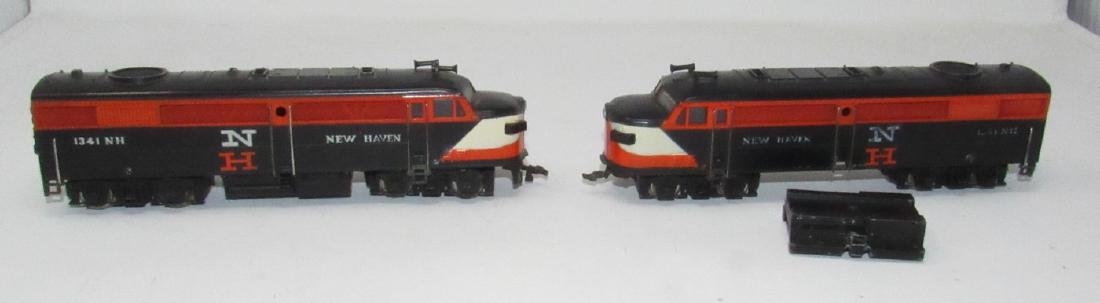 2 New Haven Fleischmann 1341 NH HO Scale Locomotives: One is missing parts. Both sold in untested condition.
