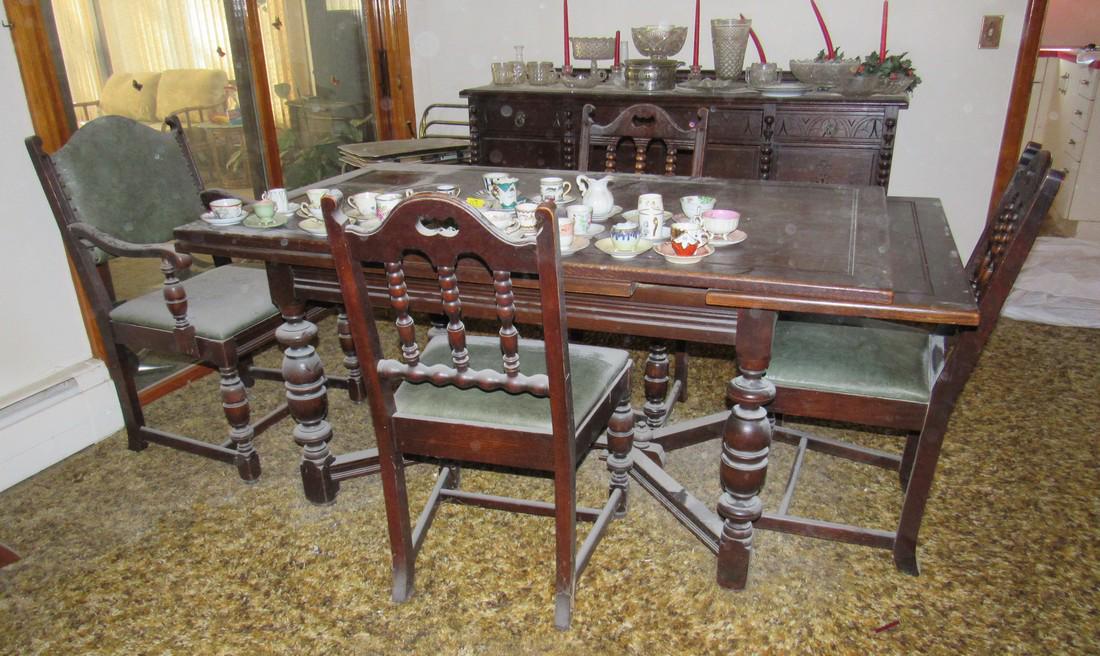 Table and 6 Chairs: Table is approx 36" x 60" ( when closed ) has two 18" extensions. One of the chairs is an arm chair. Nice condition. Just needs to be cleaned. Does not include items on it