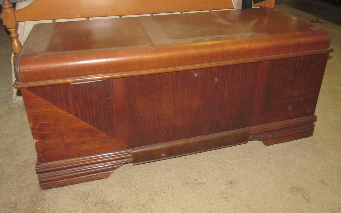 Cedar Chest and Contents: Cedar chest has some damage to it ( as pictured ) . Take what you want and leave the rest
