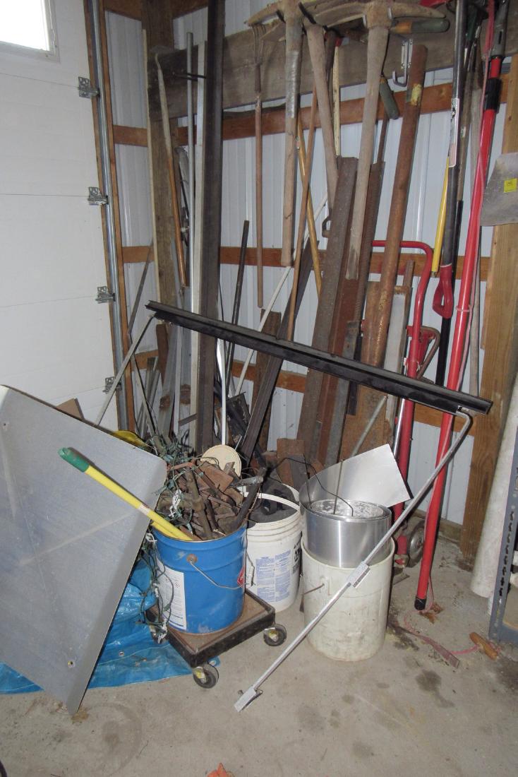 Steel Scrap Iron and Handtruck: Lot includes all steel , scrap iron, hand truck, and items in front of steel. Does not include tools on wall.