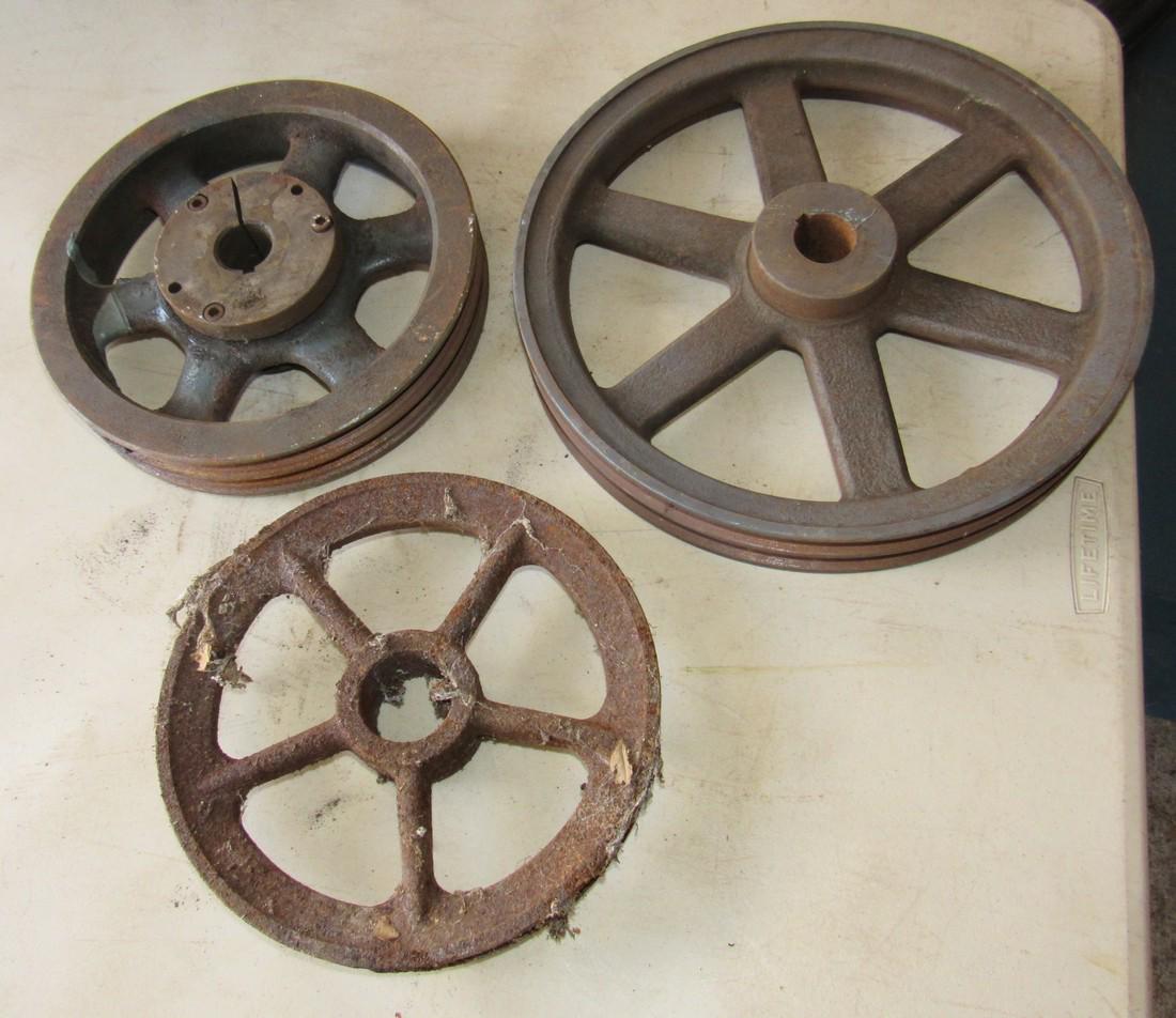 Cast Iron Pulleys: Largest is approx 12 3/4" in diameter