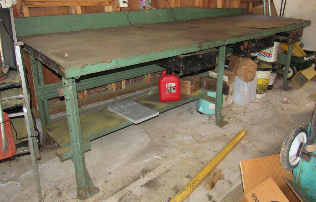 Large Industrial Workbench Table: Approx 38" x 10' x 36" tall, with a 2 1/4" thick top. Does not include any items under it, table only. Pick up preferred, in late afternoon.