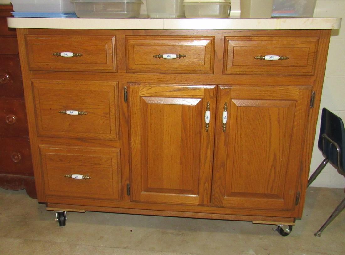 Rolling Cabinet: Approx. 30" x 51" x 40 1/4" tall. Top needs light cleaning. Does not include items on top