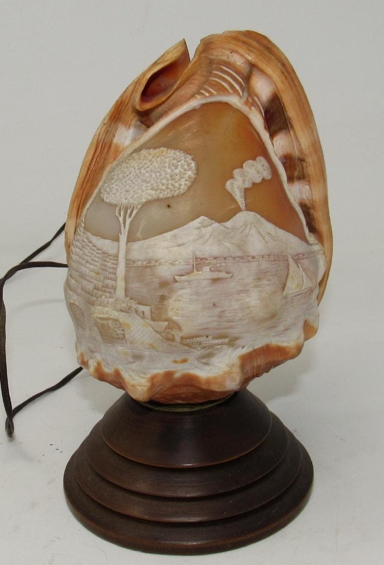 Carved Shell Lamp with Sailboat Volcano and Ship: Approx 7 1/2" tall.