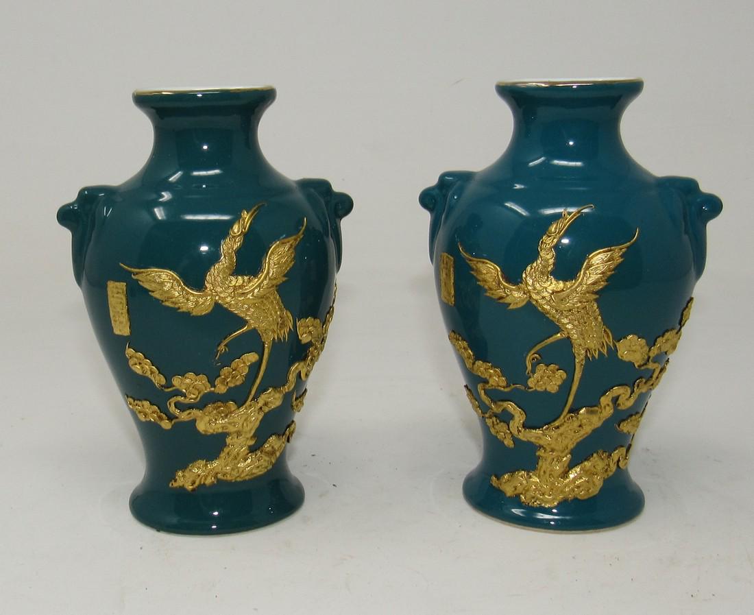 2 Vases Made in China: Approx 5 1/4" tall.