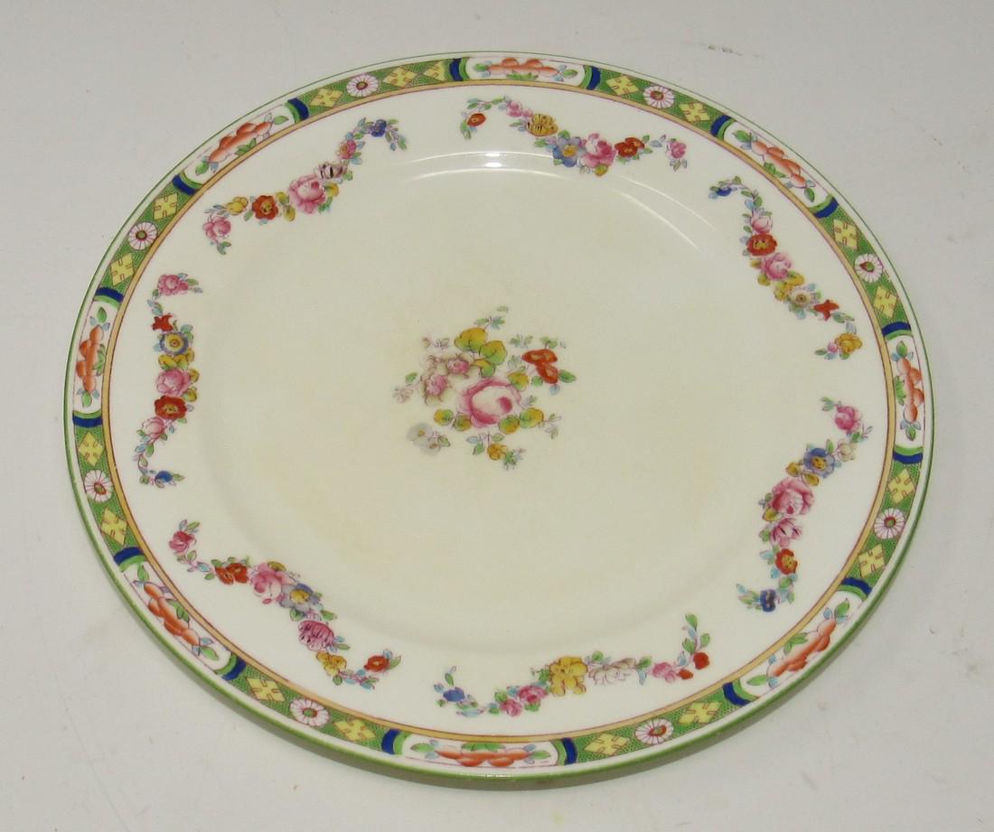 Set of 7 Mintons England Plates: Approx 8 7/8" in diameter.