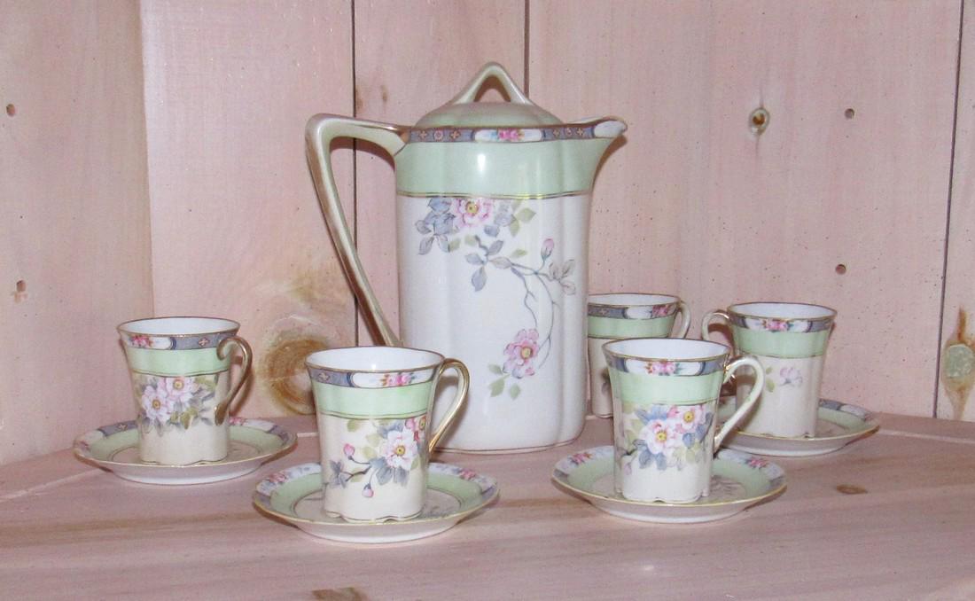 Hand Painted Nippon Chocolate Set: Lot includes 4 saucers , 5 cups, and pitcher ( 9" tall )