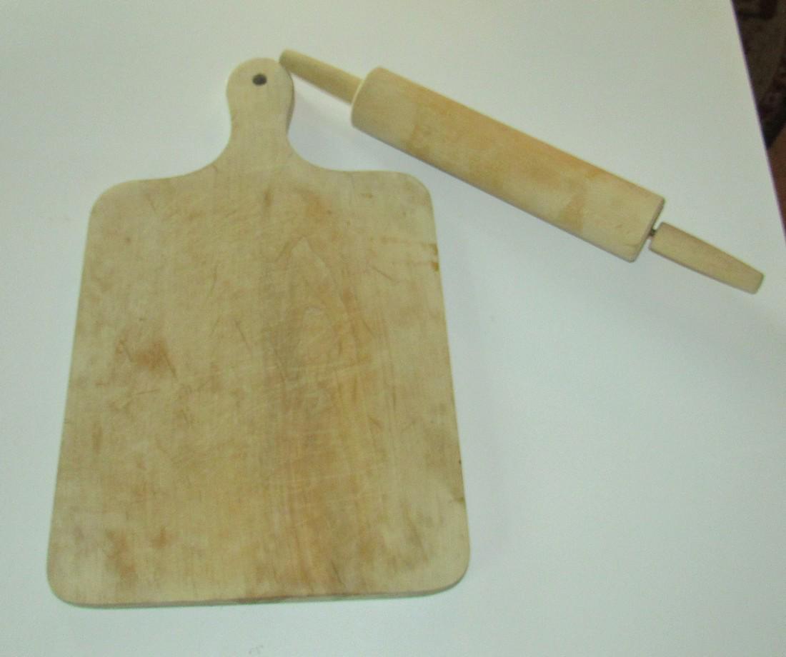 Cutting Board and Rolling Pin: Cutting board is approx 10 1/2" x 17 1/2"