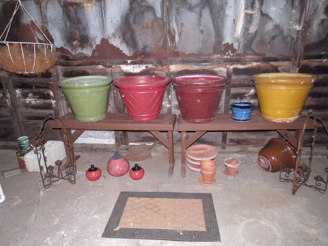 Planters Benches Torches Hanging Candle Sconces: Planters are approx 20" in diameter and 15" tall. Most planters are composite / plastic