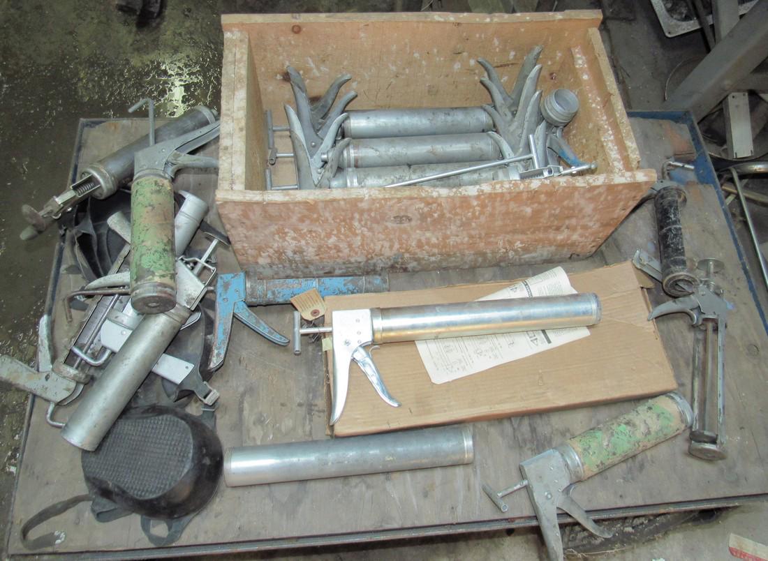 Caulk Guns: Getting all caulk guns pictured. Approx 20 total. We do not guarantee they are complete. Comes with knee pads