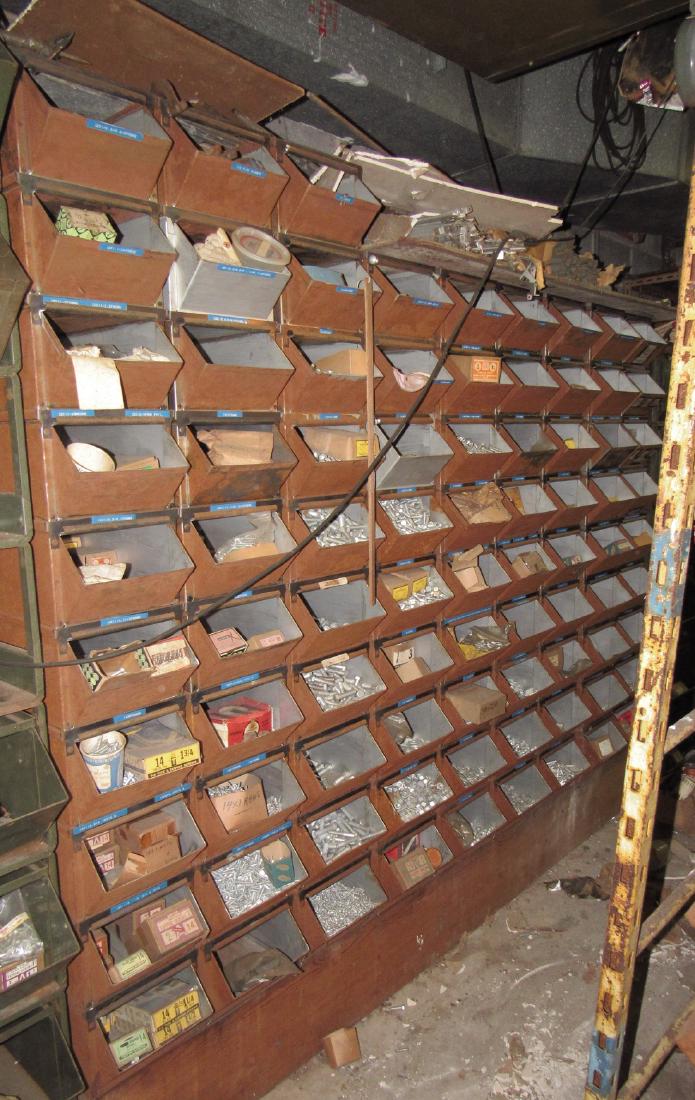 Large Industrial 84 Bin Parts Cabinet Organizer: Each row is approx 10 1/4" x 23" x 67" tall. 3 rows are 1 stack higher. Includes nuts, machine screws, tapping screws, bolts, carriage bolts, cap screws, and misc hardware. Also includes things above 
