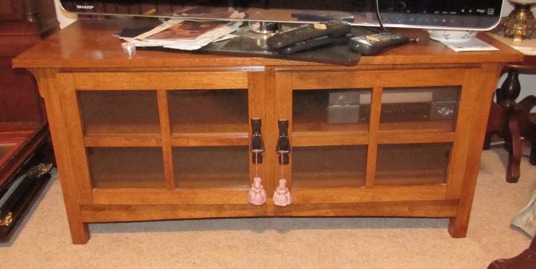 2 Door TV Stand: Approx 19" x 46" x20 1/2" tall. Does NOT include any items on or in it
