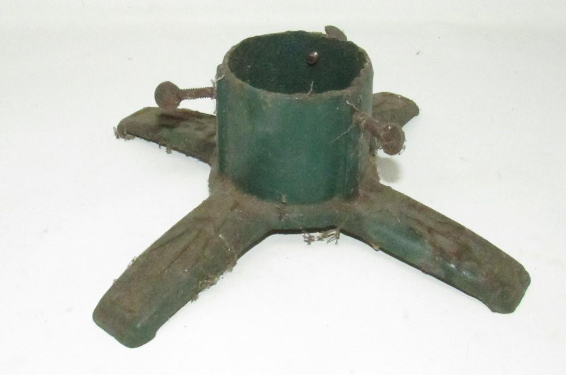 Cast Iron Tree Stand: Approx 3 1/2" tall, inside hole diameter is approx. 2 7/8"