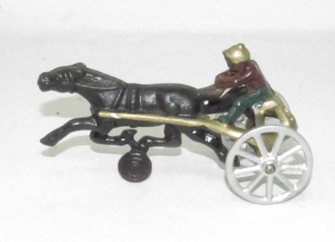 Cast Iron Jockey Horse Racing Toy: Apprx 5 1/2" long