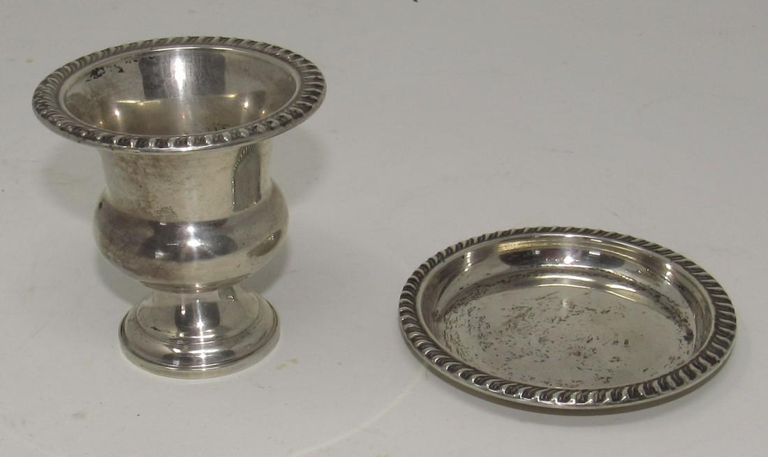 Sterling Silver Empire Miniature Urn and Coaster: Urn is approx 2 3/4" tall and 2 3/4" in diameter and is weighted. Coaster is approx 3 3/8" in diameter.