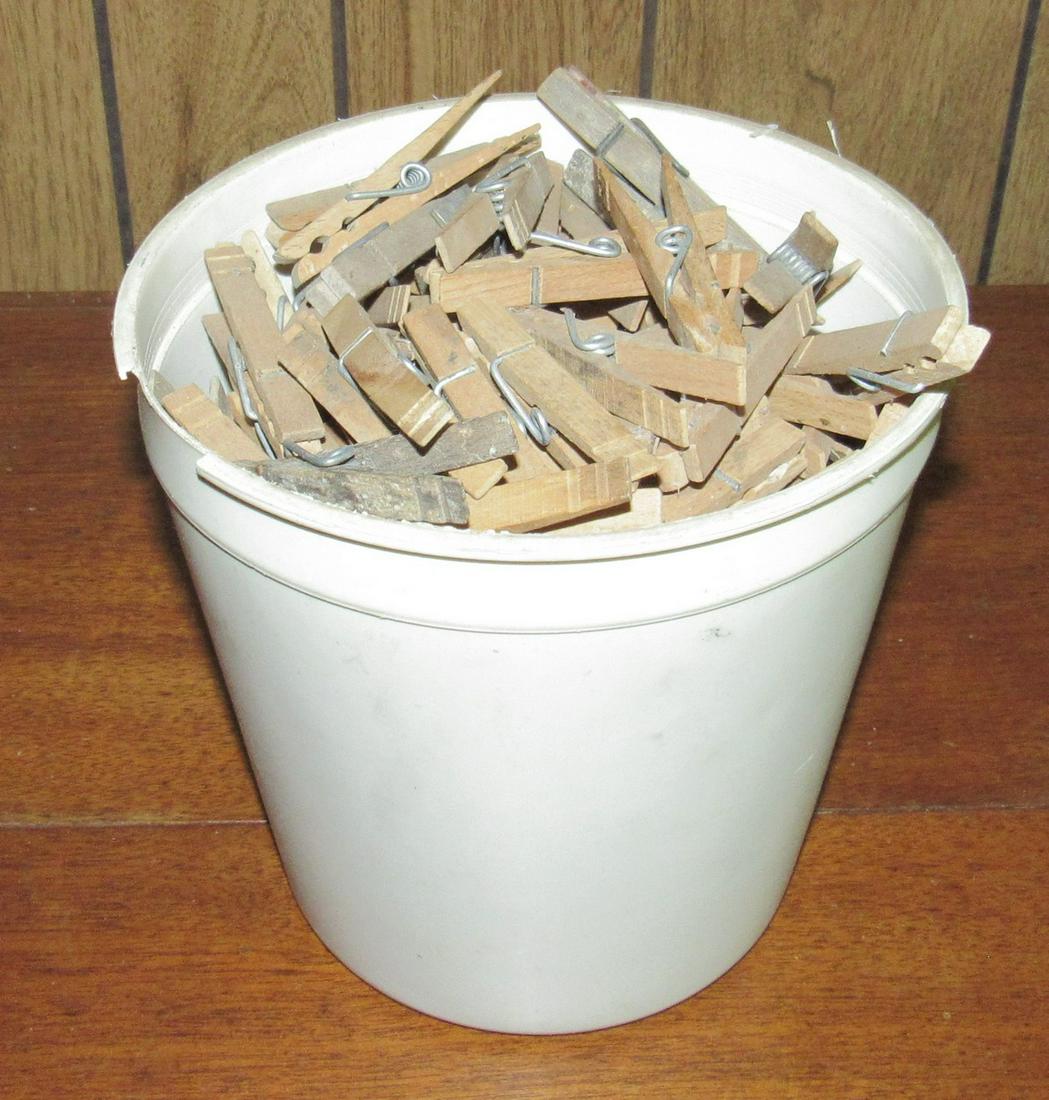 Bucket Full of Wooden Clothes Pins (1 of 2)
