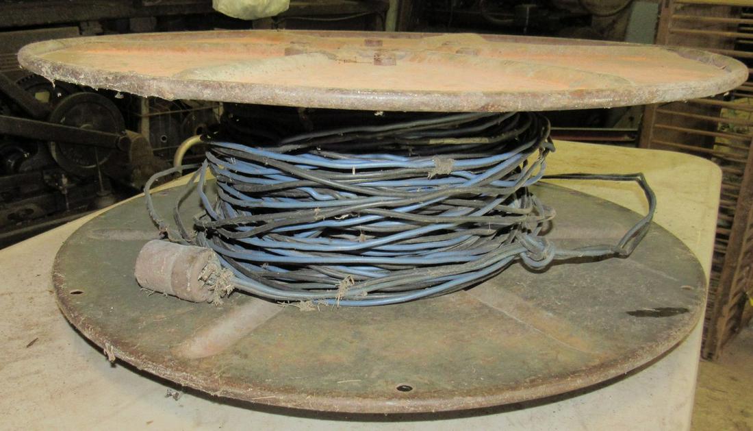 Copper Wire on Metal Spool: Spool is approx 22" in diameter