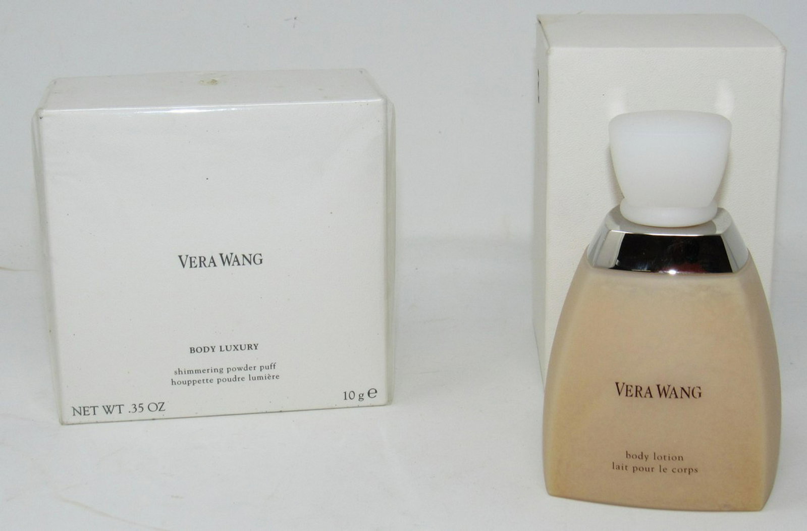 Vera Wang Body Luxury Powder Puff Still Sealed: Powder Puff is .35 oz , also included is body lotion, but it looks like it is broke down.