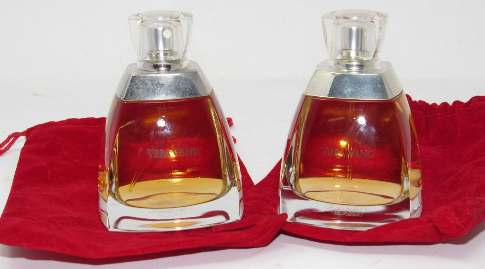 2 Vera Wang Perfume Bottles: Both are 3.4 fl oz and seem to be full