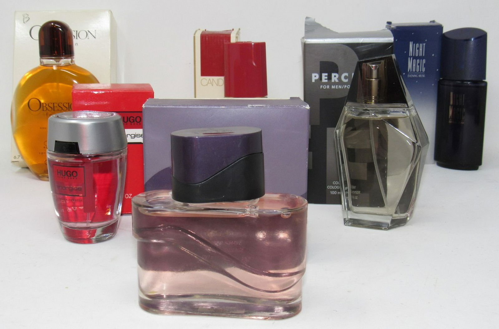 Calvin Klein Obsession Hugo Perceive Night Magic: Getting all pictured. Obsession ( back left is 6.7 fl oz). All are full or very close to full.