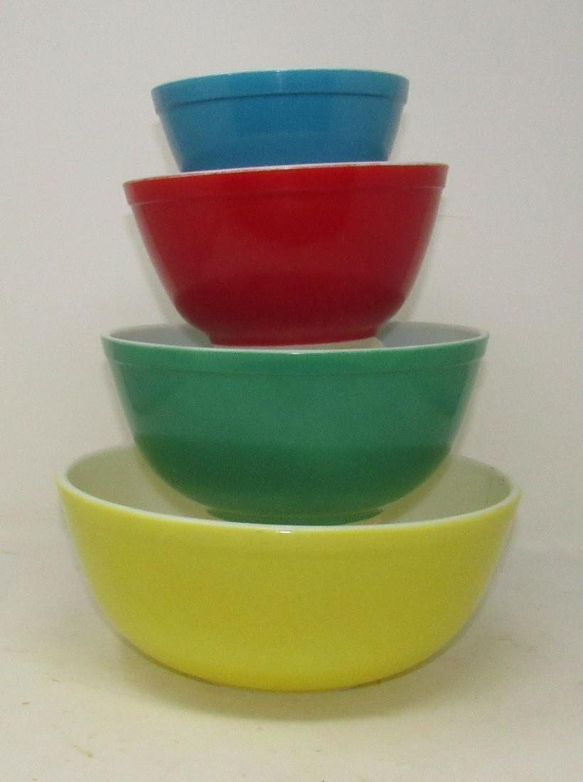 Set of 4 Pyrex Primary Mixing Bowls: Largest is apprx 10 1/2" in diameter.