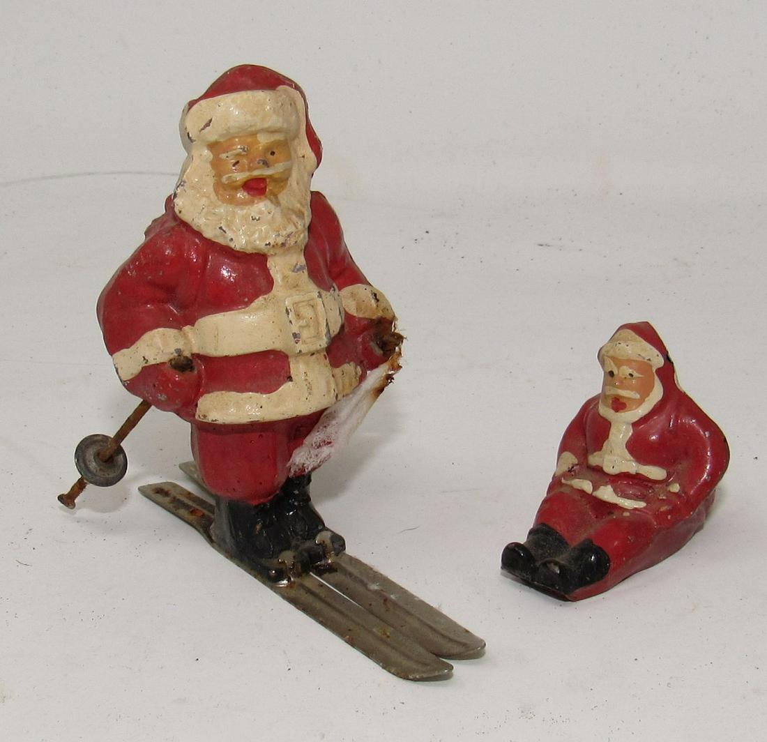 Lead Skiing Santa Claus Christmas Decorations: Getting both. Skiing santa is approx 3" tall