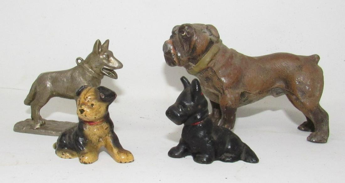 Pot Metal Pewter and Iron Dogs: Shephard seems to be pewter, Large dog in back is pot metal and approx 3 3/4" long. 2 Dogs in front are iron
