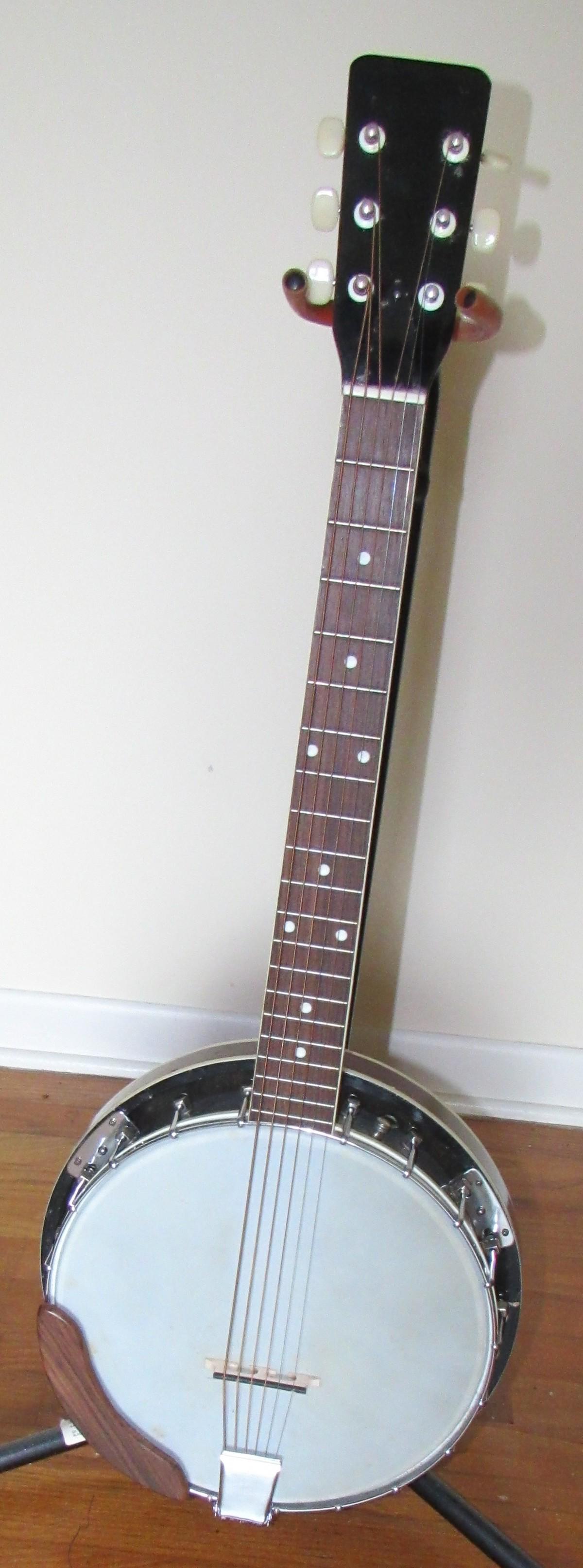 Banjo: Approx 12 3/4" wide and 34" long.