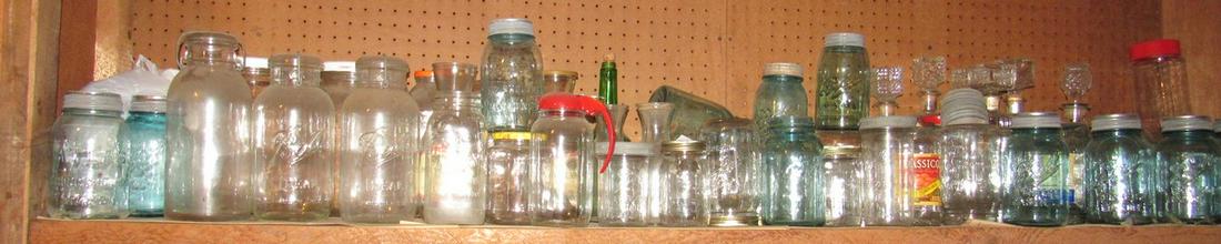 Shelf Full of Canning Jars: Getting all on shelf.