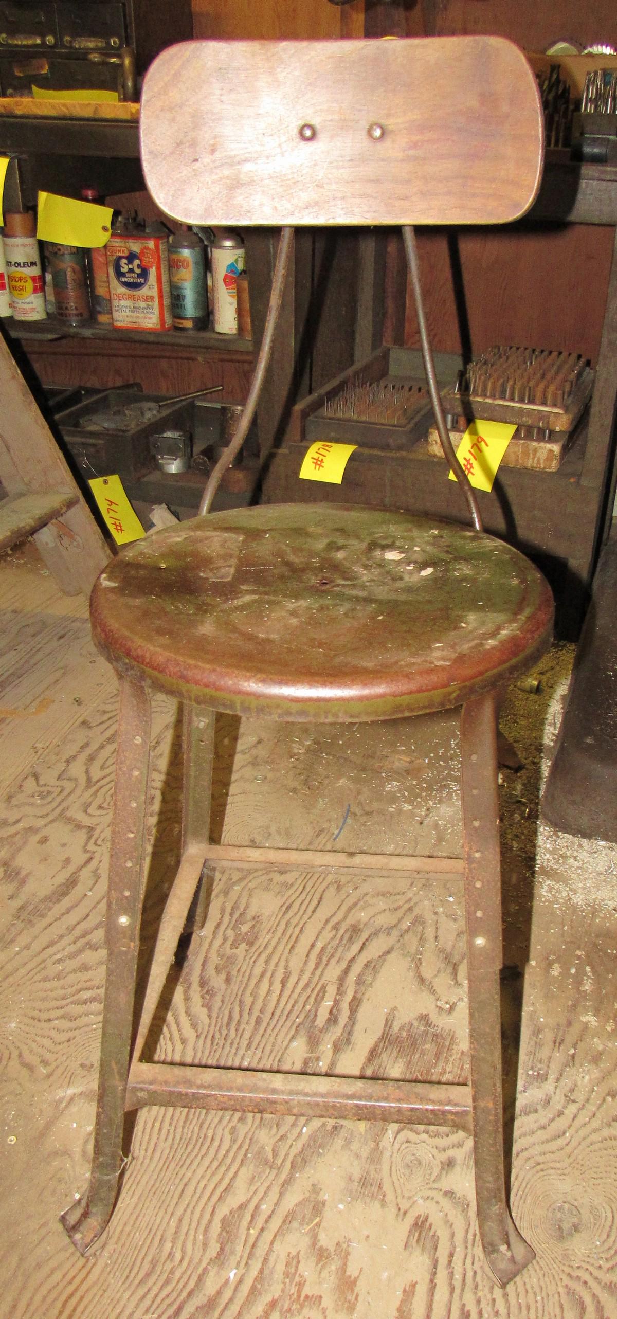 Vintage Industrial Stool: Seat is metal.
