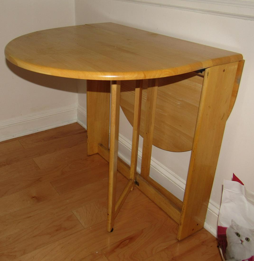 Pine Kitchen Table: Approx 31" x 45"x 30" tall ( when both leaves are open)