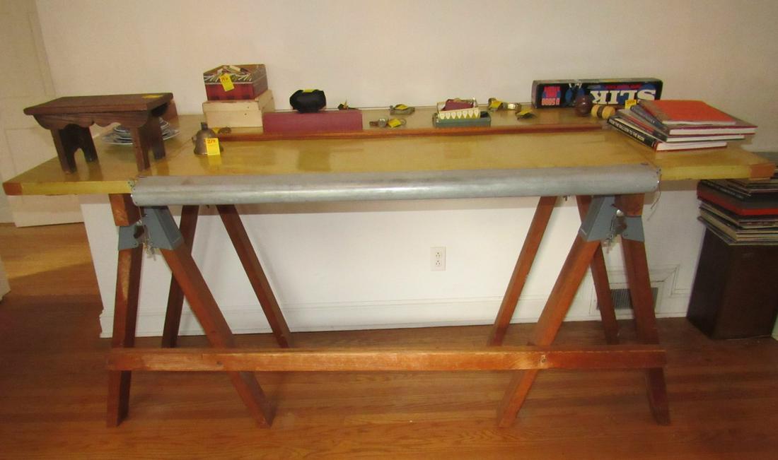 Drafting Table on Saw Horses: Apprx 36" x 80" . DOES NOT INCLUDE ITEMS ON IT