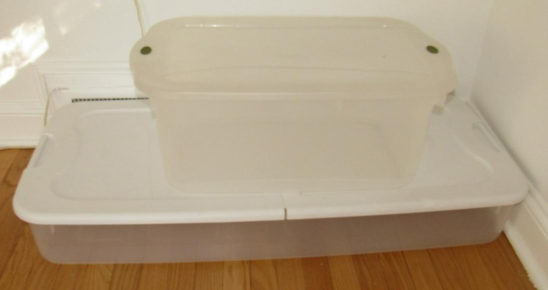 2 Plastic Totes: One on bottom is approx 20" x 43" x 6 1/2" tall