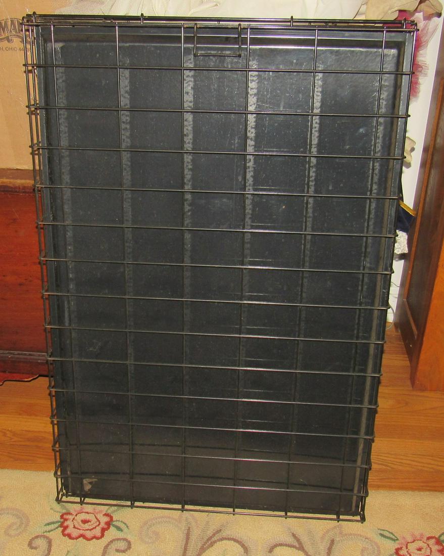Large Dog Crate: Apprx 28" x 42" . Not sure on height