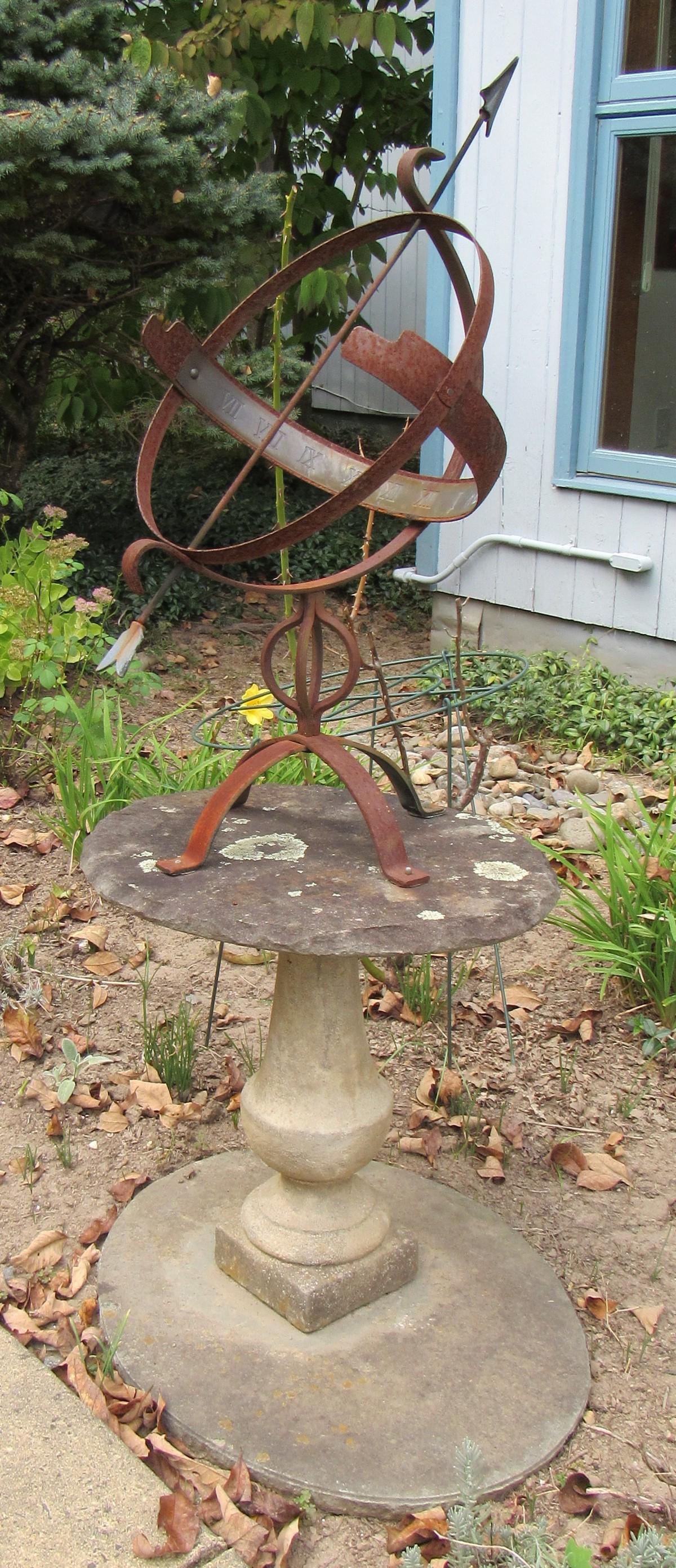 Sundial and Concrete Base: Base is approx 18" tall. Sundial is approx 15" in diameter and 29 1/2" tall