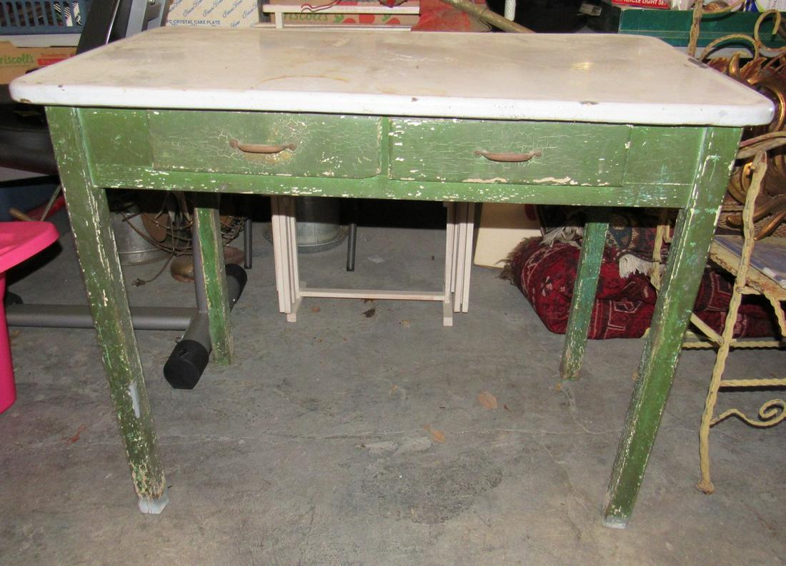Porcelain Top Table: Approx 25" x 40"