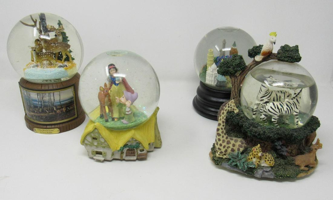4 Snowglobes Disney Musical Dept. 56: Misc. snowglobes. Tallest approx 7/34" Tall